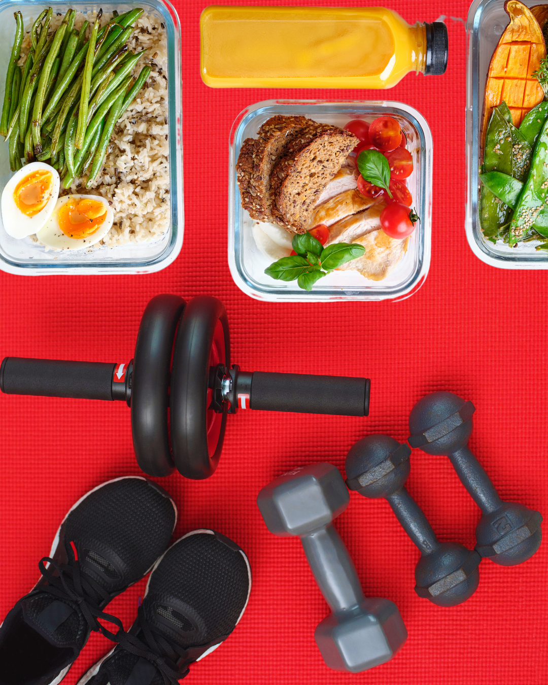 Meal plans in glass containers and fitness equipment